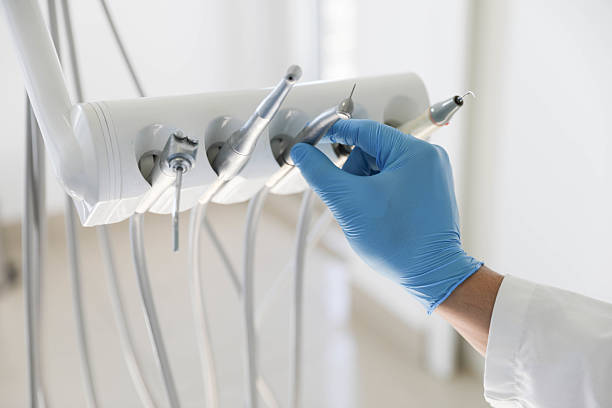 Professional Tooth Extraction technician working in Chandler, IN